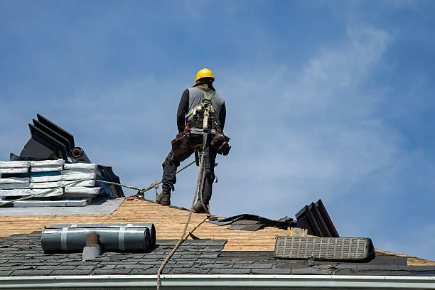 Professional Roofing technician working in Sharpes, FL